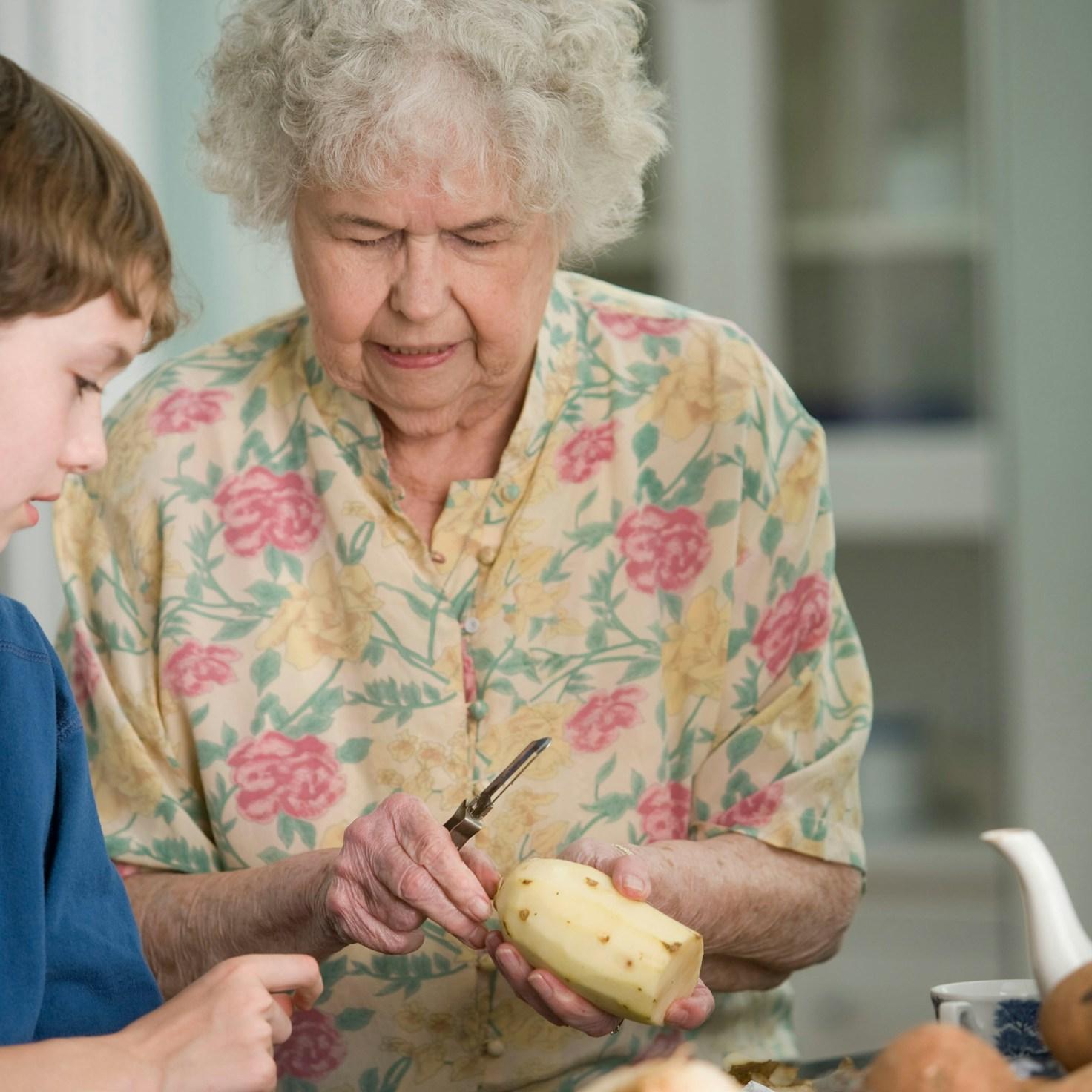 Community members collaborating in a contemporary kitchen space, sharing recipes and techniques